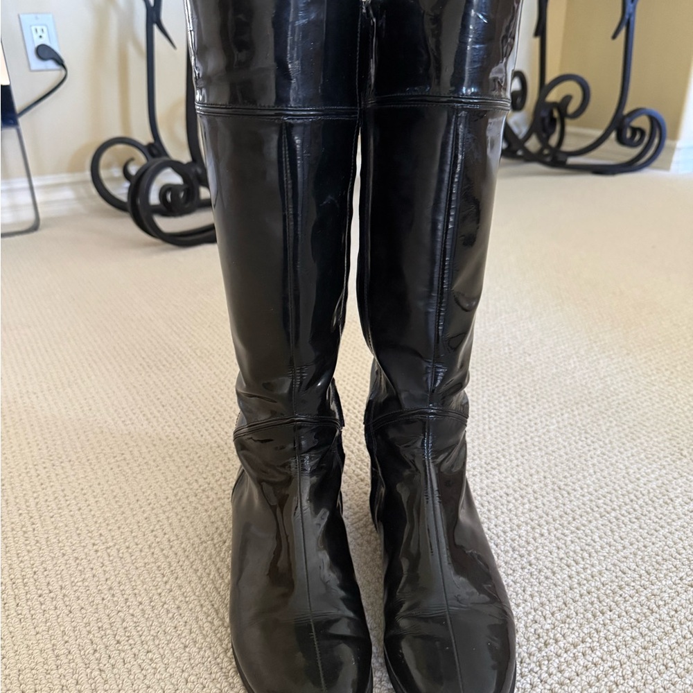 Cole Haan Glossy Black Winter Boots with Nike Air cushioning.